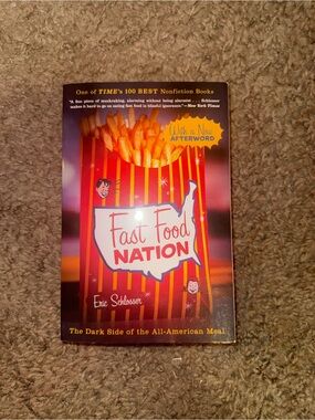 Fast Food Nation by Eric Schlosser - Red & Yellow Cover